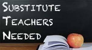 Chalkboard sign with a red apple and an open book that reads Substitute Teachers Needed