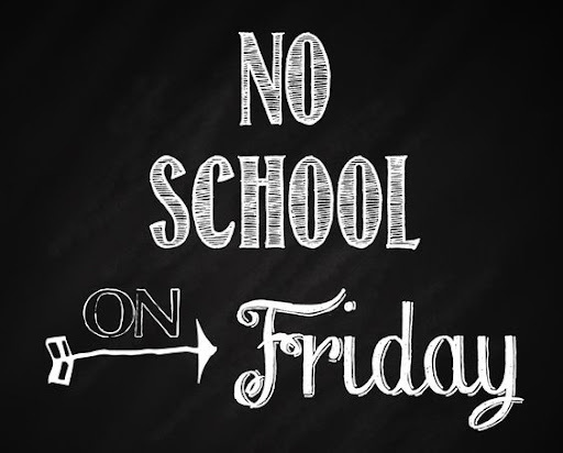 Blackboard sign that reads, "No School Friday" in white letters